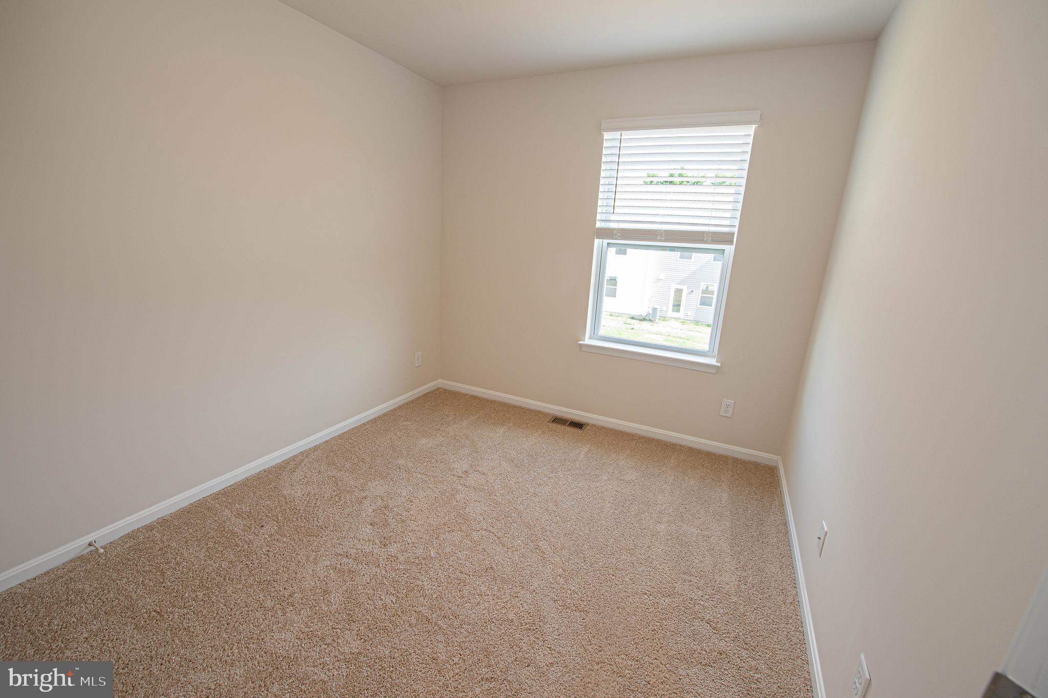 126 Willowtree Lane Fruitland, MD 21826 - Photo 58 of 68 an empty room with a window