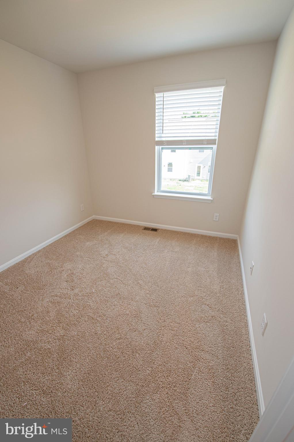 126 Willowtree Lane Fruitland, MD 21826 - Photo 59 of 68 an empty room with windows and closet