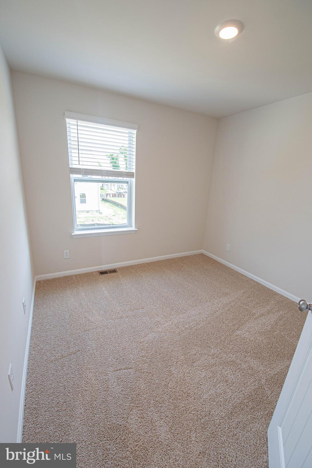 126 Willowtree Lane Fruitland, MD 21826 - Photo 63 of 68 an empty room with a window