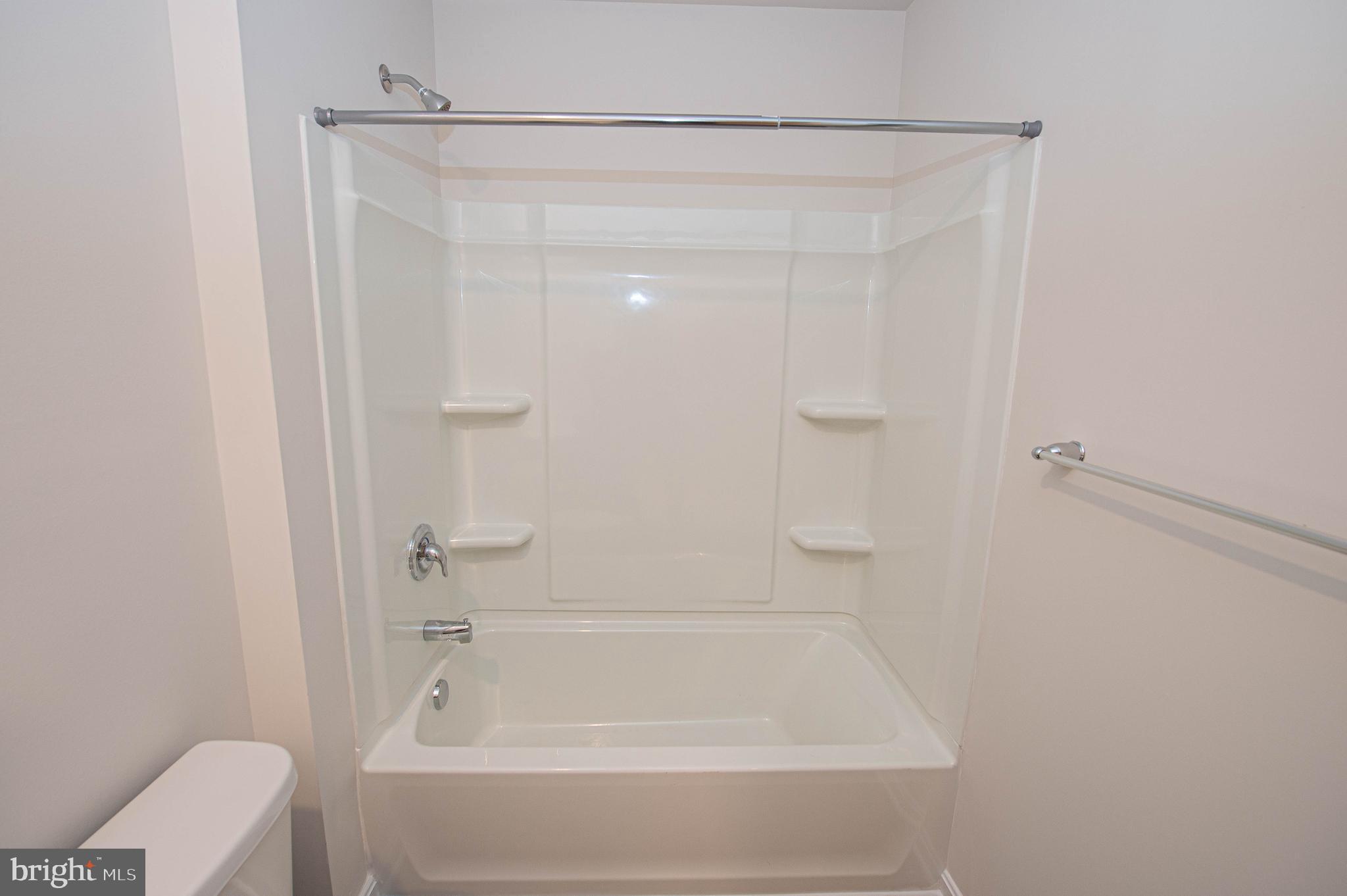 126 Willowtree Lane Fruitland, MD 21826 - Photo 67 of 68 a bathroom with a shower and a toilet