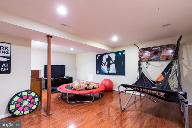 a room with furniture and wooden floor