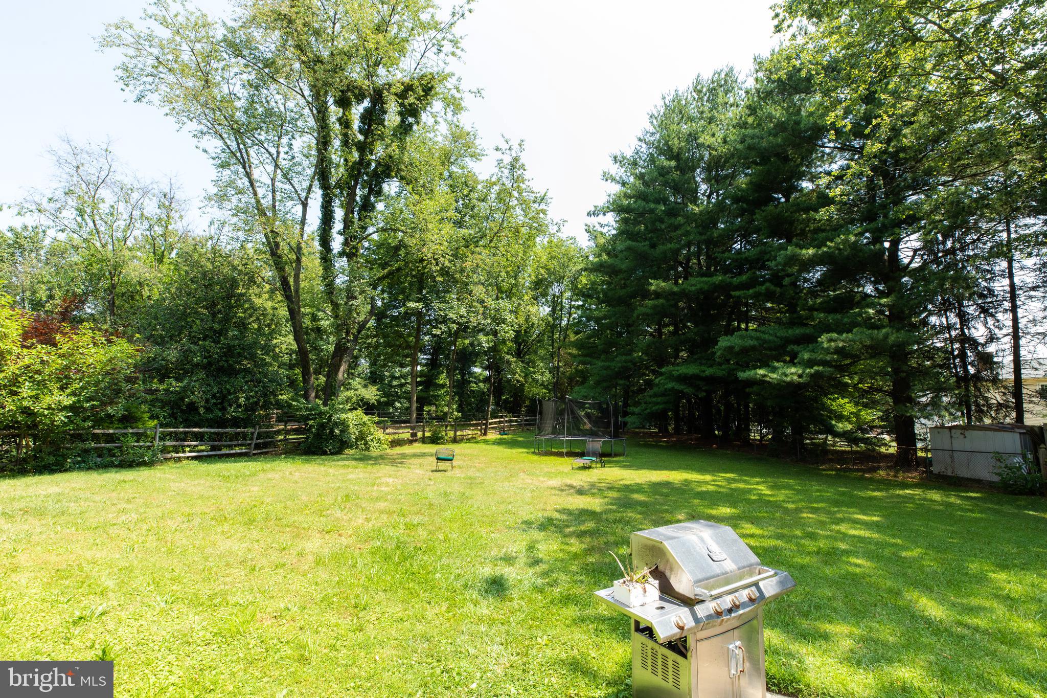 2527 Lindley Terrace Rockville, MD 20850 - Photo 26 of 31 a swimming pool with outdoor seating and yard