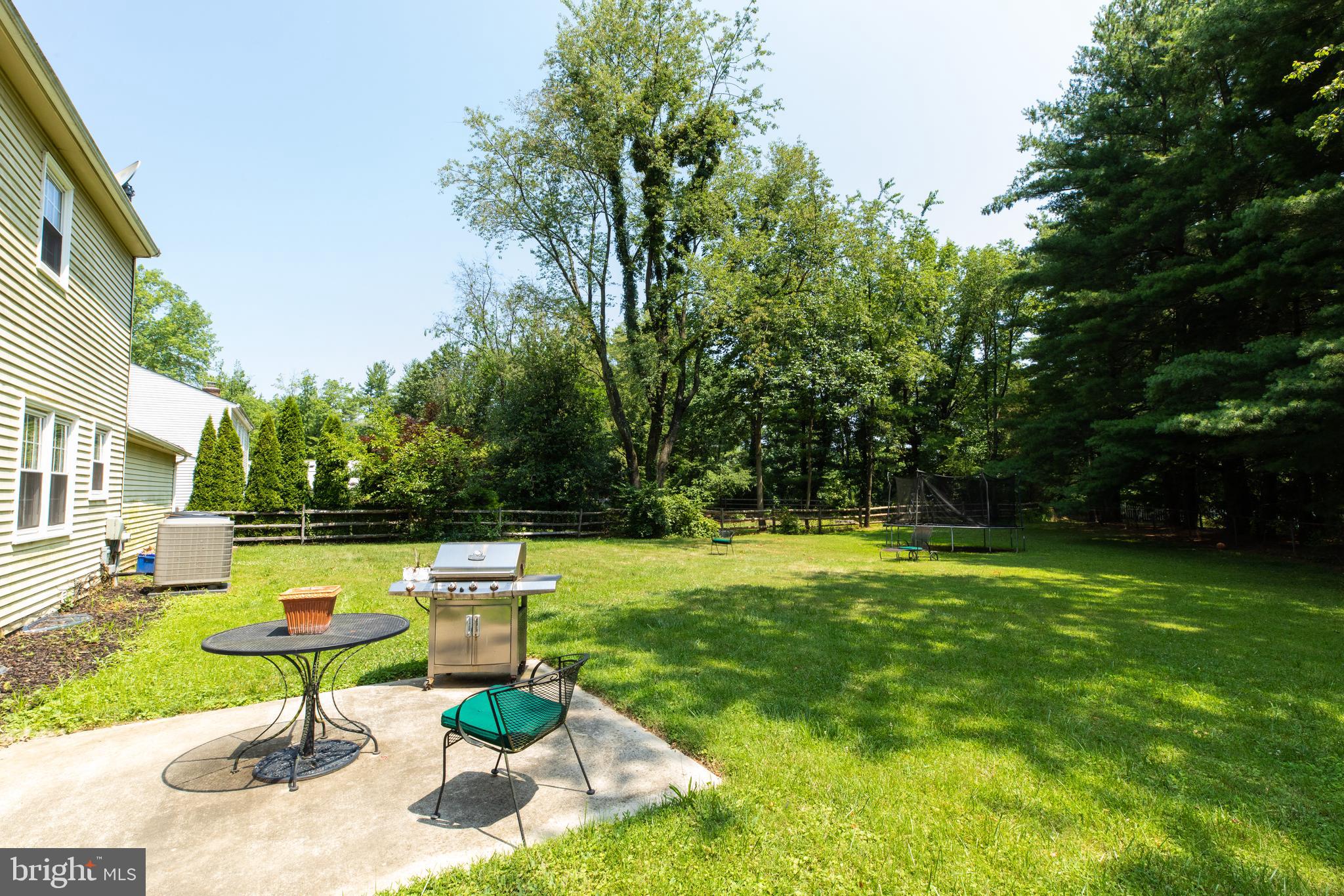 2527 Lindley Terrace Rockville, MD 20850 - Photo 28 of 31 a swimming pool with outdoor seating and yard