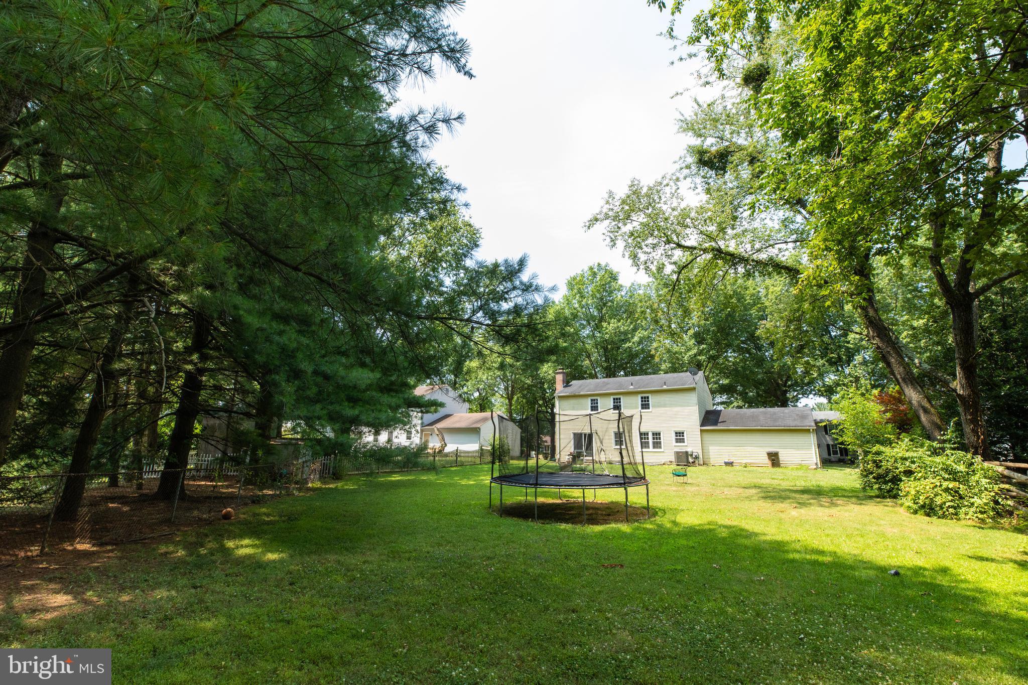 2527 Lindley Terrace Rockville, MD 20850 - Photo 31 of 31 a view of a house with backyard sitting area and garden