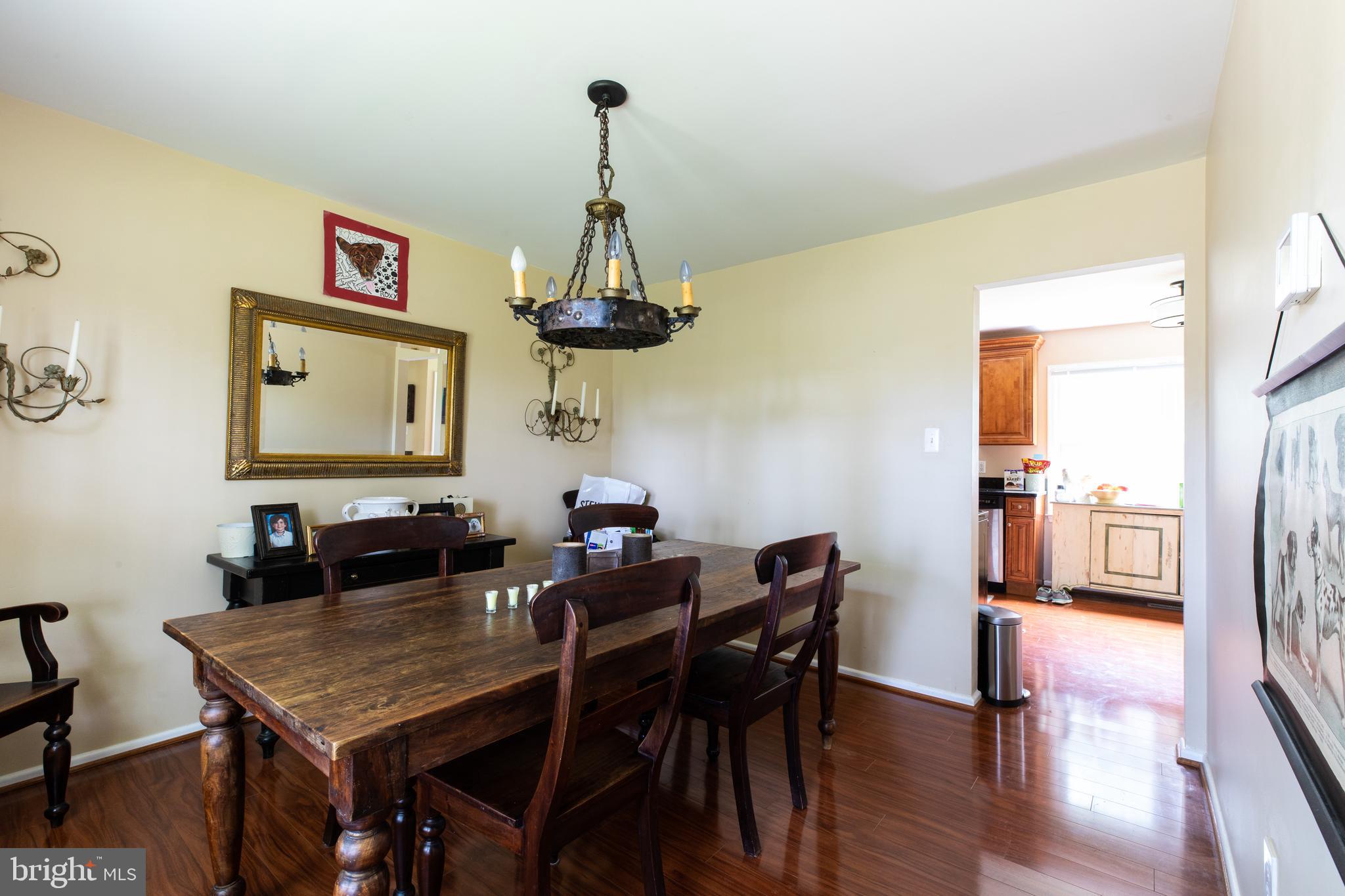 2527 Lindley Terrace Rockville, MD 20850 - Photo 7 of 31 a view of a dining room with furniture