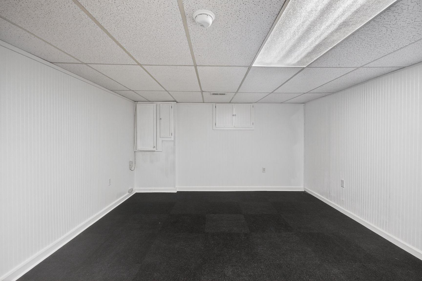 4202 Yates Road Beltsville, MD 20705 - Photo 24 of 31 Lower level flex space for hom gym or hobbies.