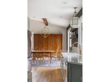 a dining room with wooden floor