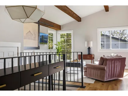 a kitchen with a refrigerator and cabinets