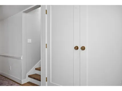 a bedroom with a bed and a cabinets