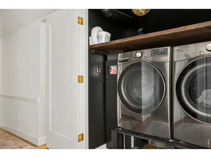 a view of a chairs and table in patio