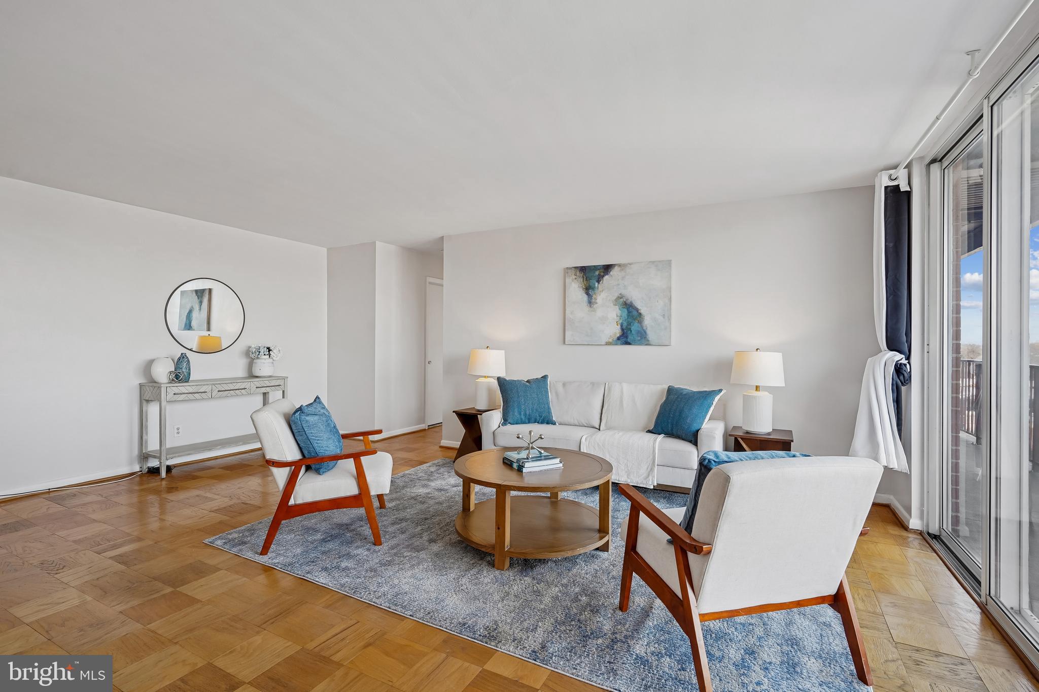 a living room with furniture and a table