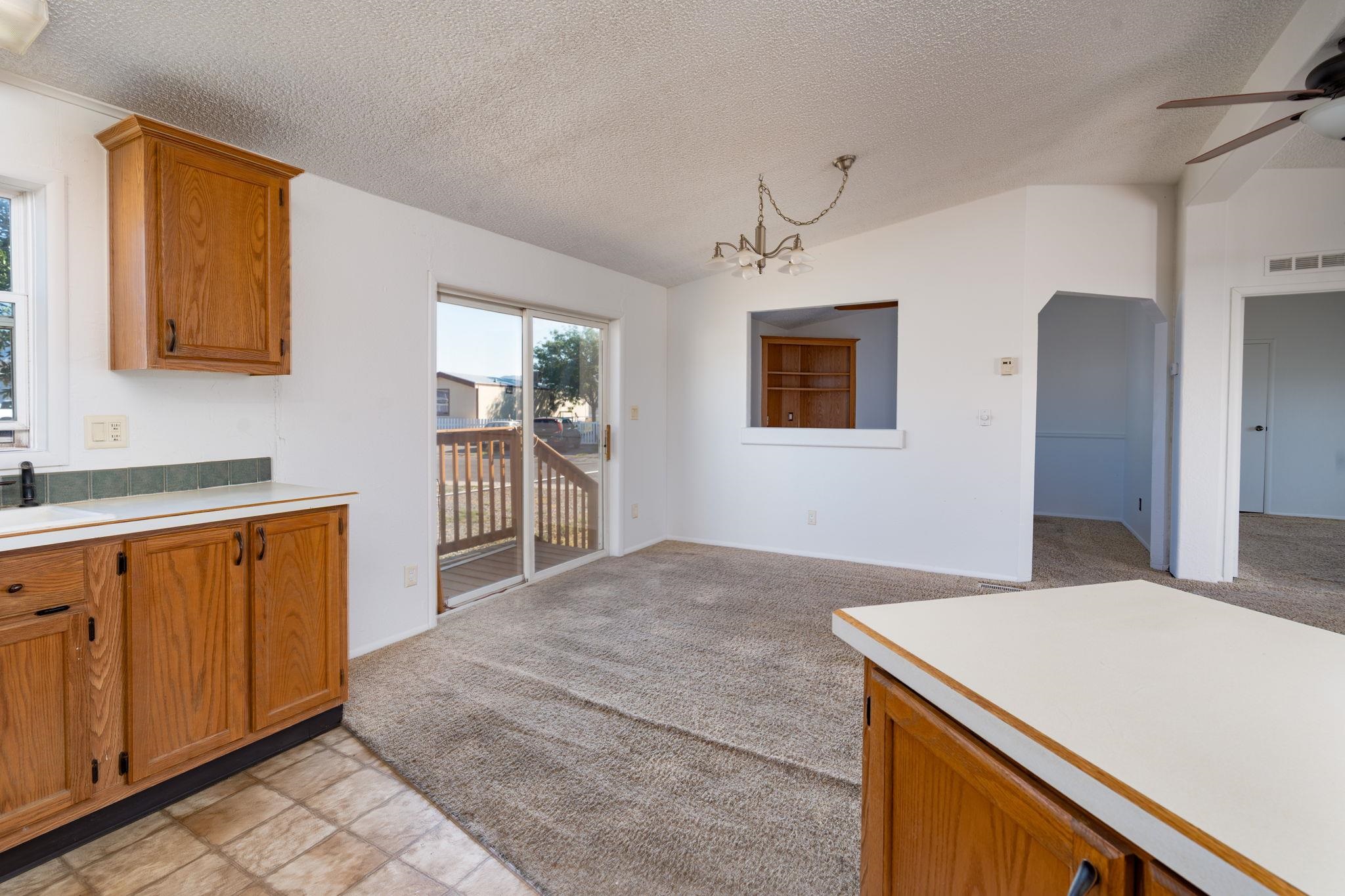424 32 Road, Unit 284 Clifton, CO 81520 - Photo 15 of 21 a kitchen with a stove and a cabinets