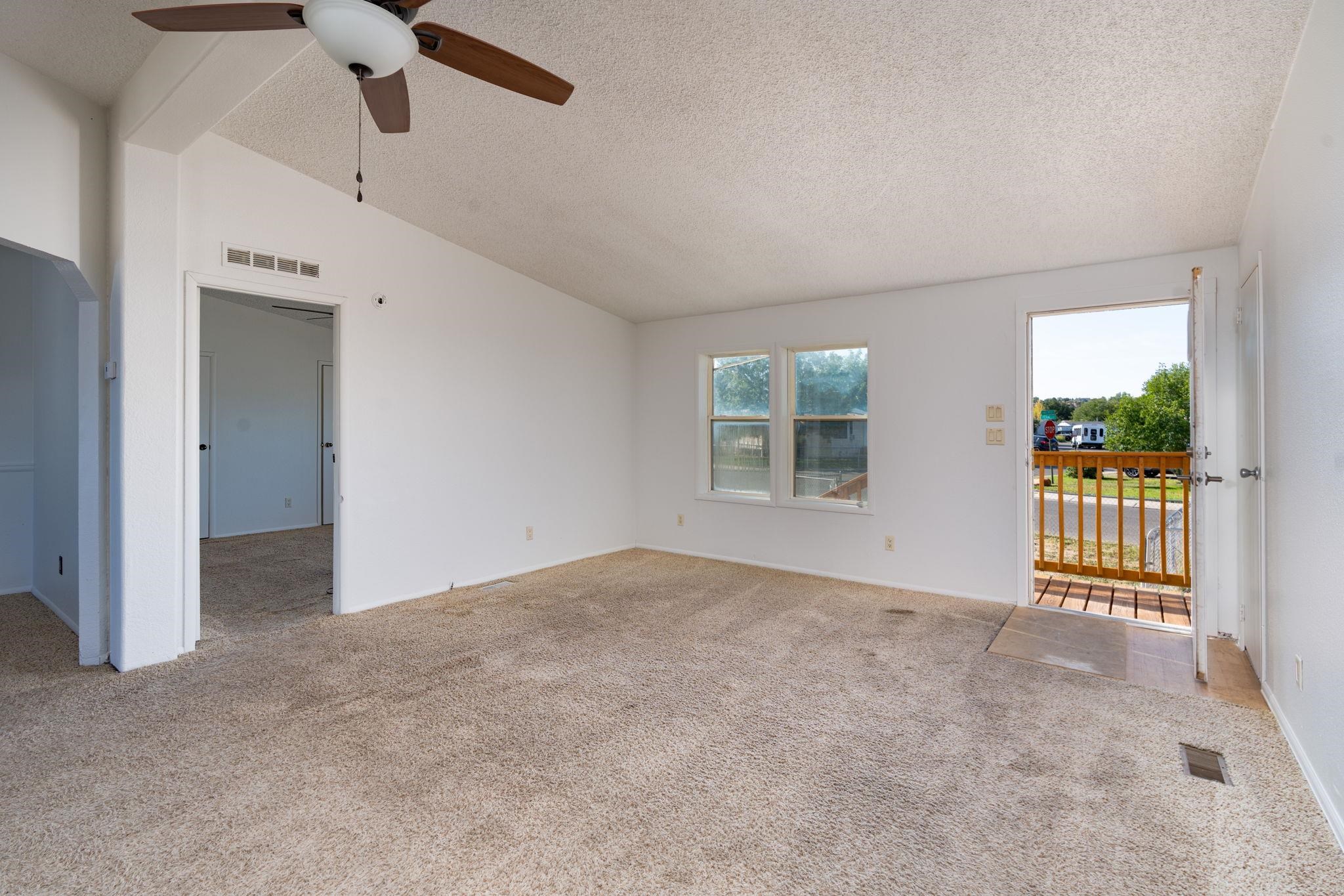 424 32 Road, Unit 284 Clifton, CO 81520 - Photo 18 of 21 an empty room with windows and entrance