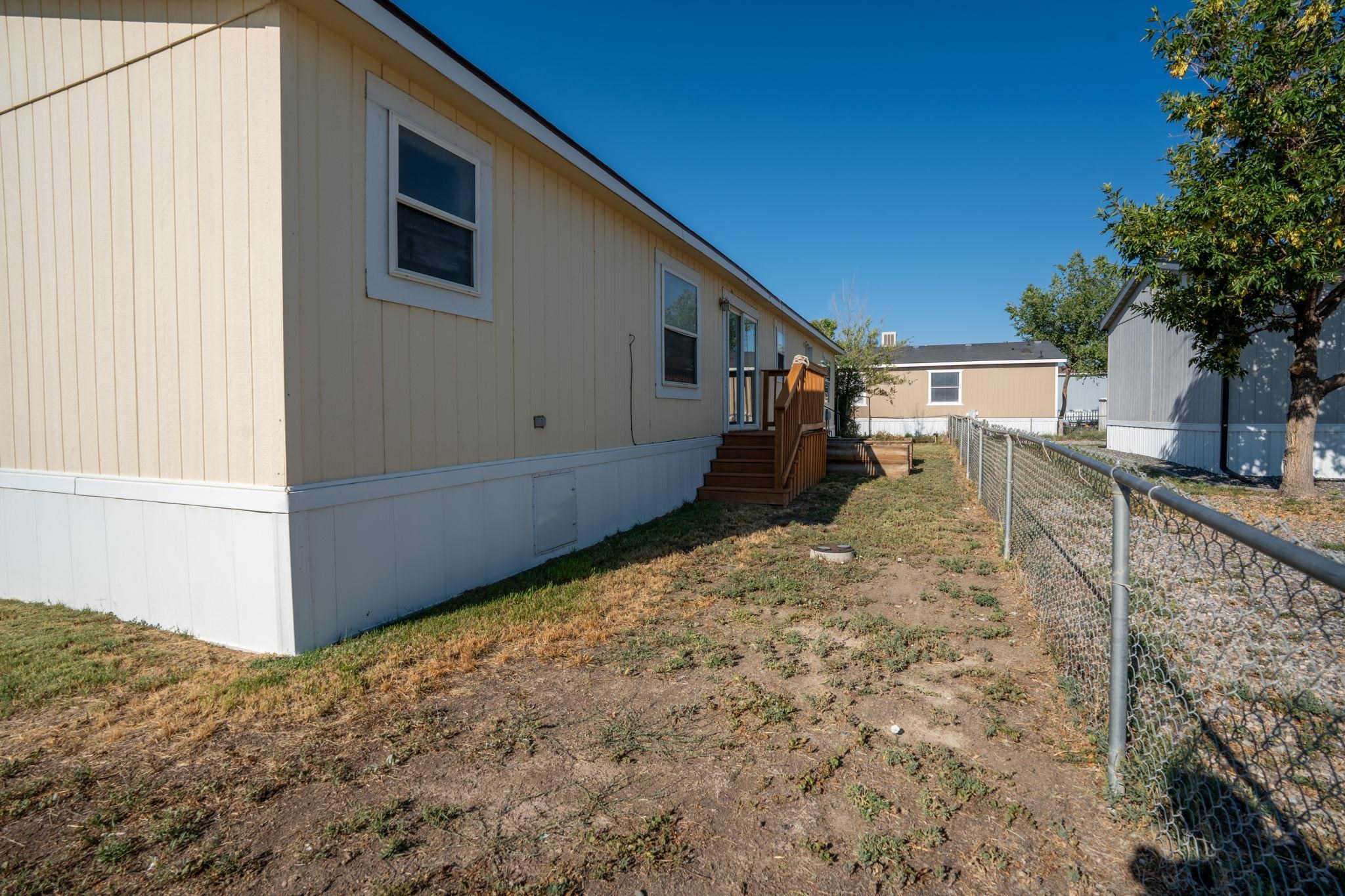 424 32 Road, Unit 284 Clifton, CO 81520 - Photo 19 of 21 a backyard of a house