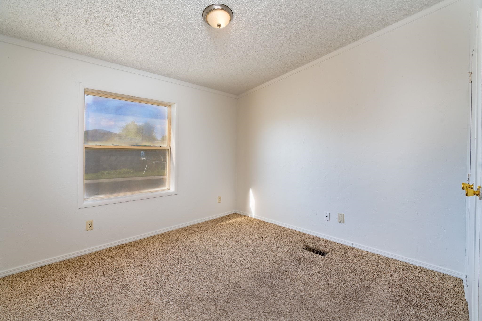 424 32 Road, Unit 284 Clifton, CO 81520 - Photo 8 of 21 an empty room with a window