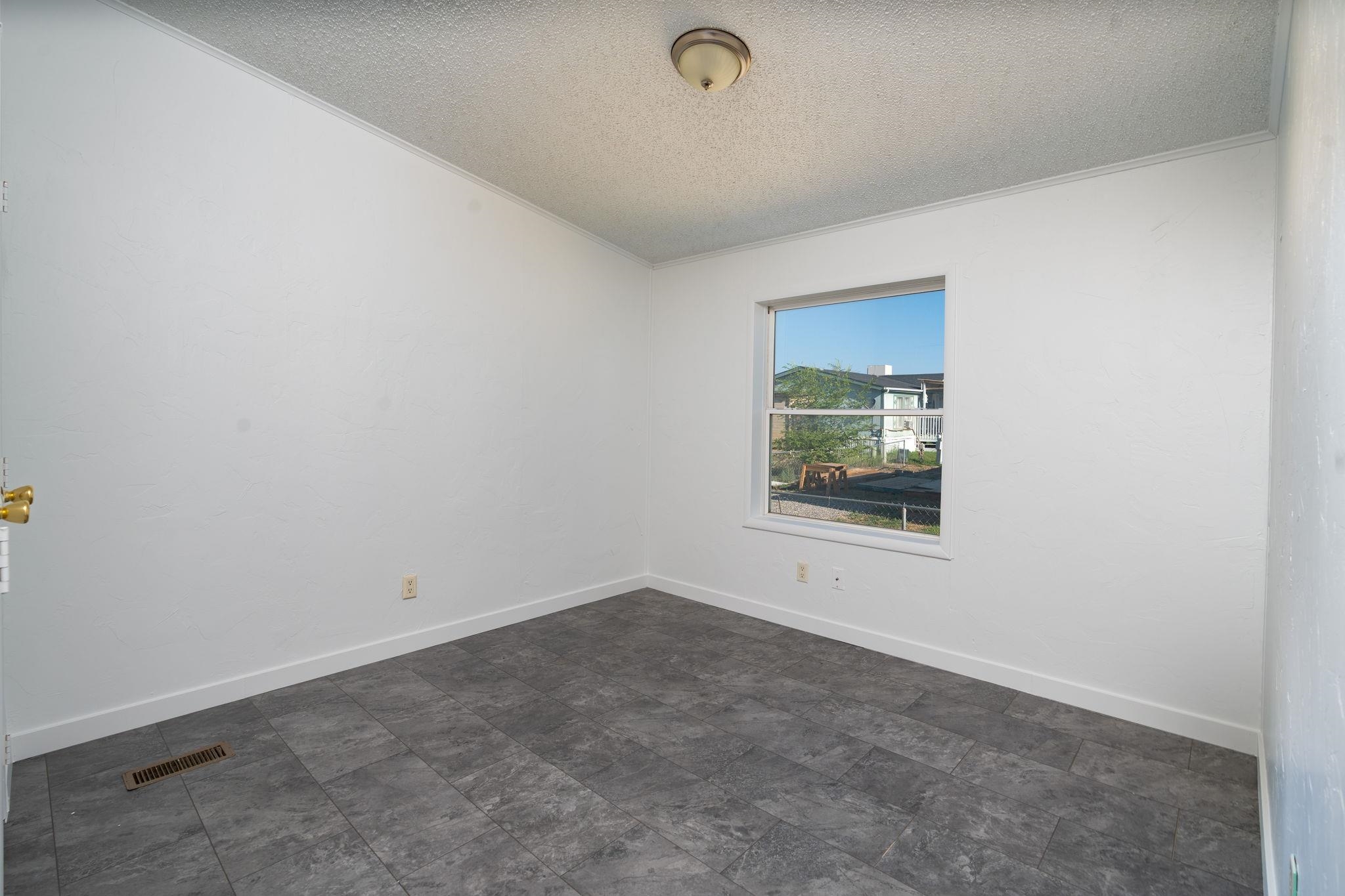 424 32 Road, Unit 284 Clifton, CO 81520 - Photo 10 of 21 an empty room with windows
