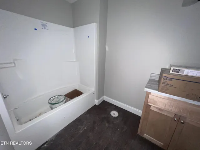 a bed room with a bed furniture and a window