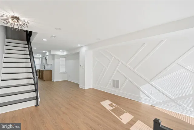 a view of a room with a staircase