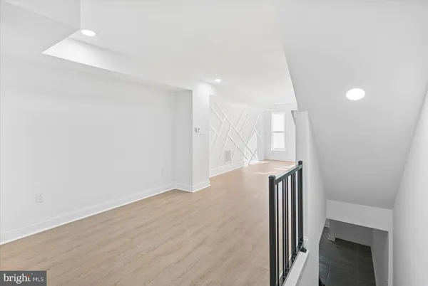 a view of a hallway with entryway