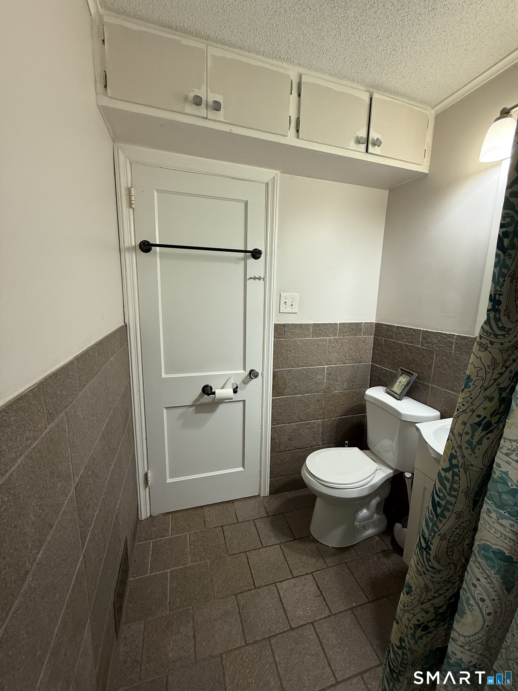 92 Garfield Road Bristol, CT 06010 - Photo 11 of 24 a bathroom with a toilet and a shower