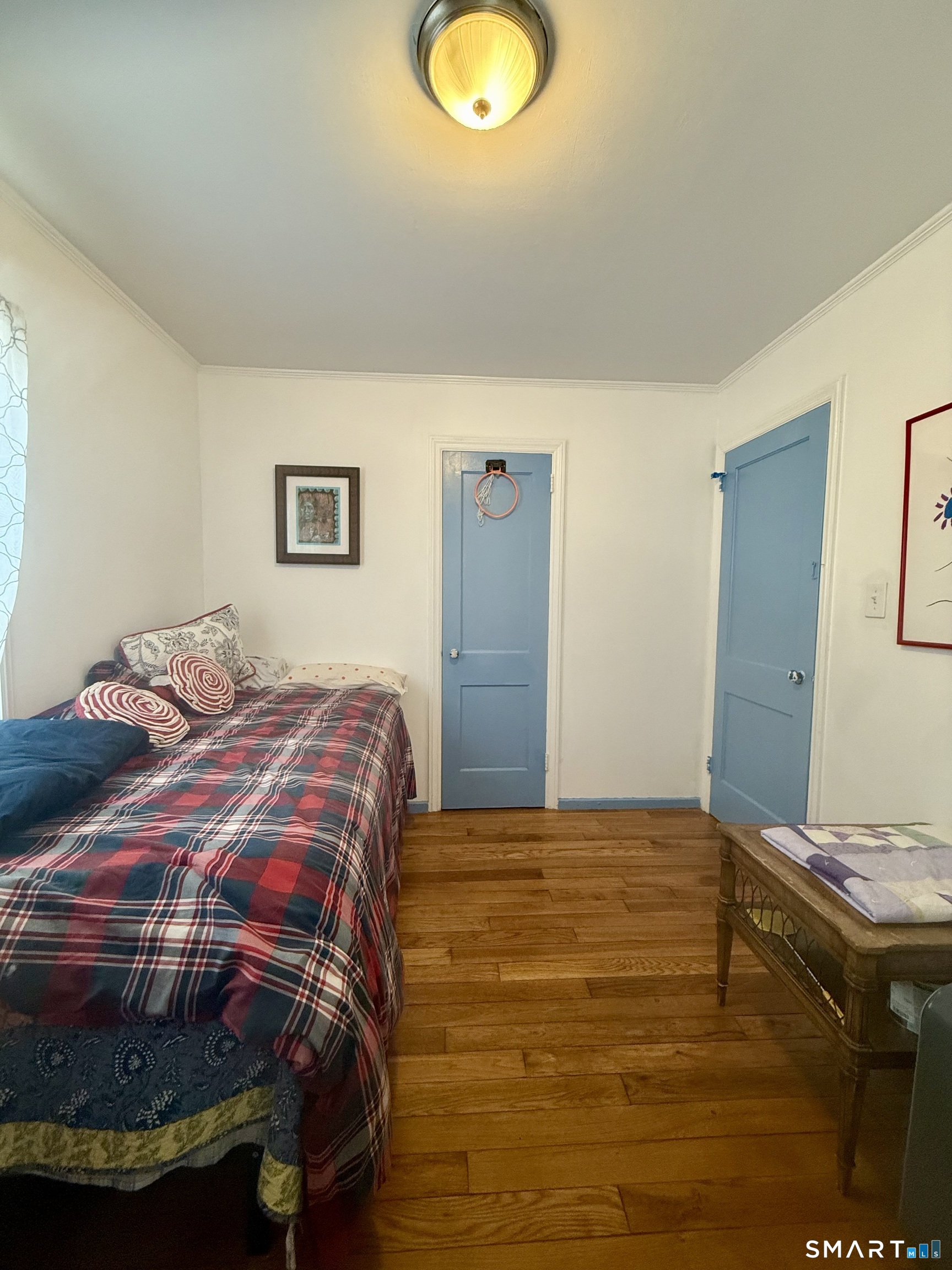 92 Garfield Road Bristol, CT 06010 - Photo 15 of 24 a bedroom with a bed and a cabinets