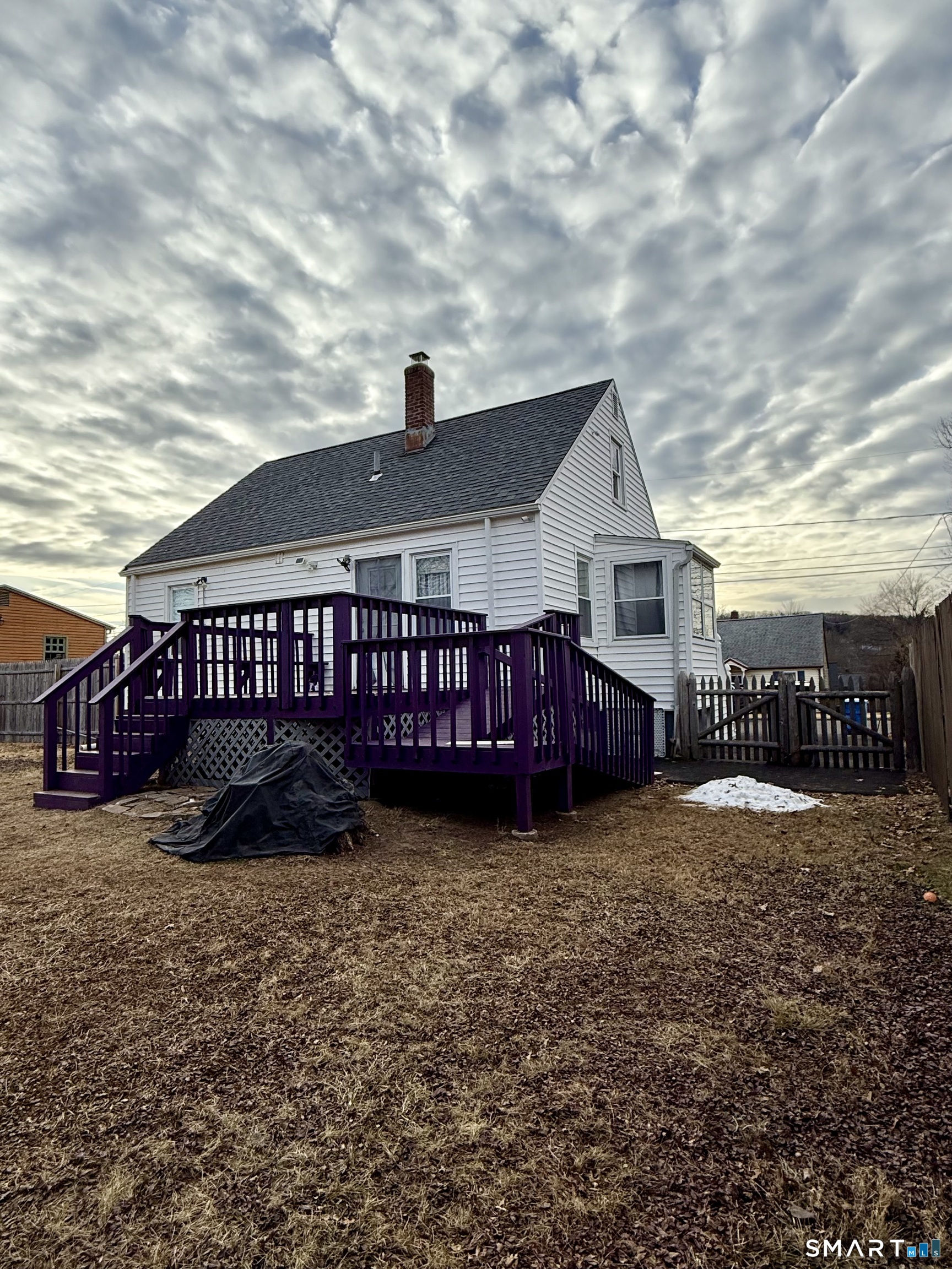 92 Garfield Road Bristol, CT 06010 - Photo 21 of 24 a view of a house with a yard and deck