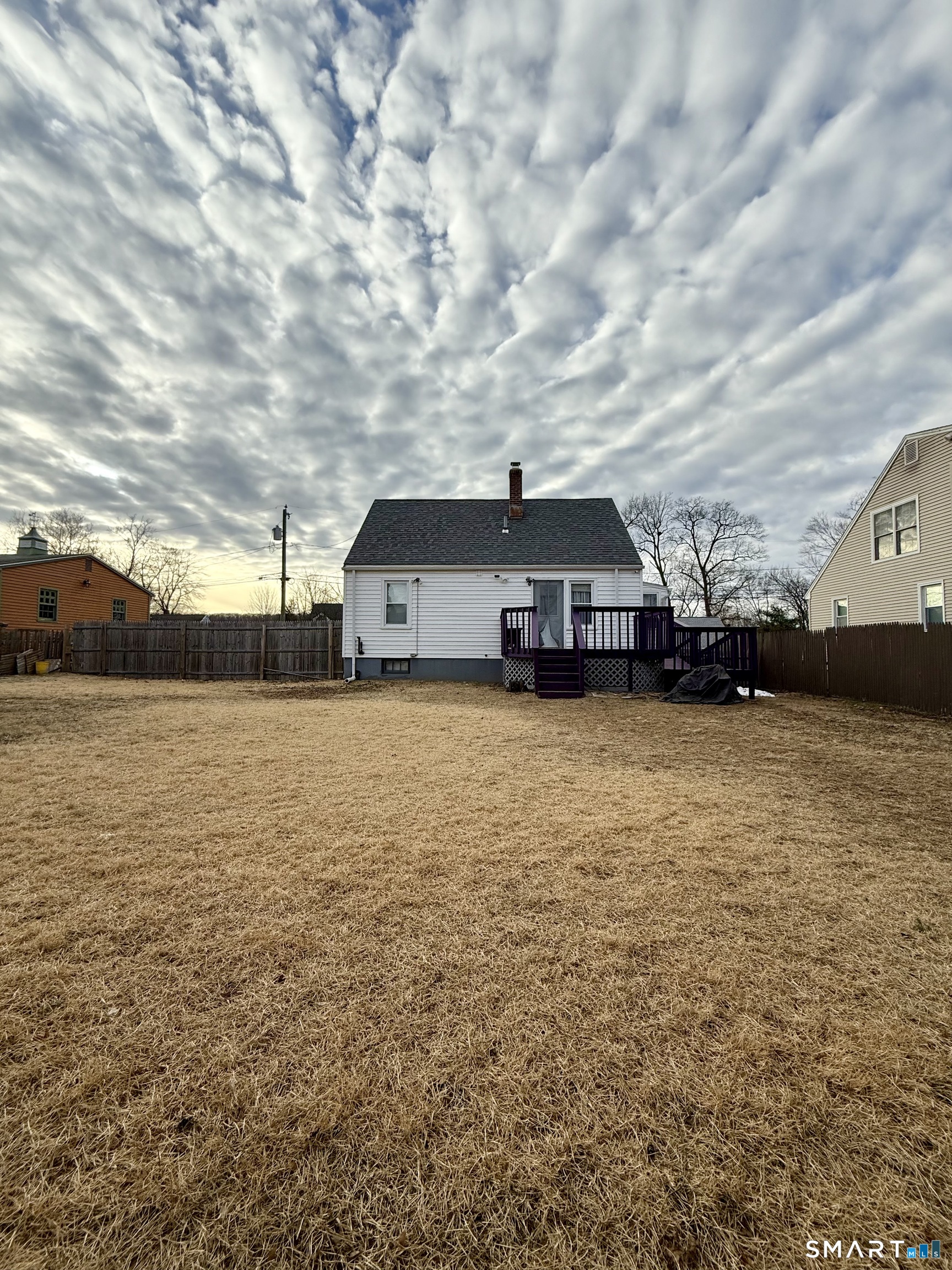 92 Garfield Road Bristol, CT 06010 - Photo 22 of 24 a car parked in front of a house with a yard