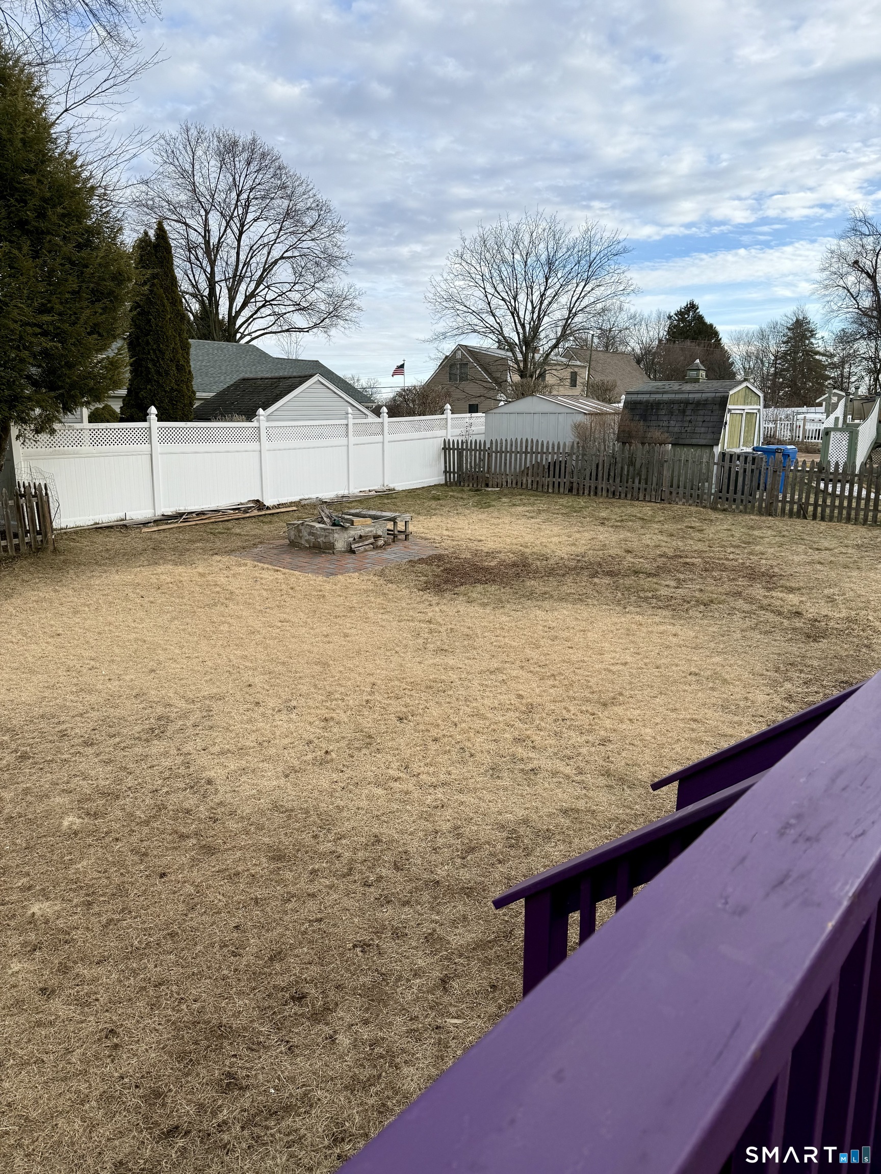 92 Garfield Road Bristol, CT 06010 - Photo 23 of 24 a view of a terrace with wooden fence