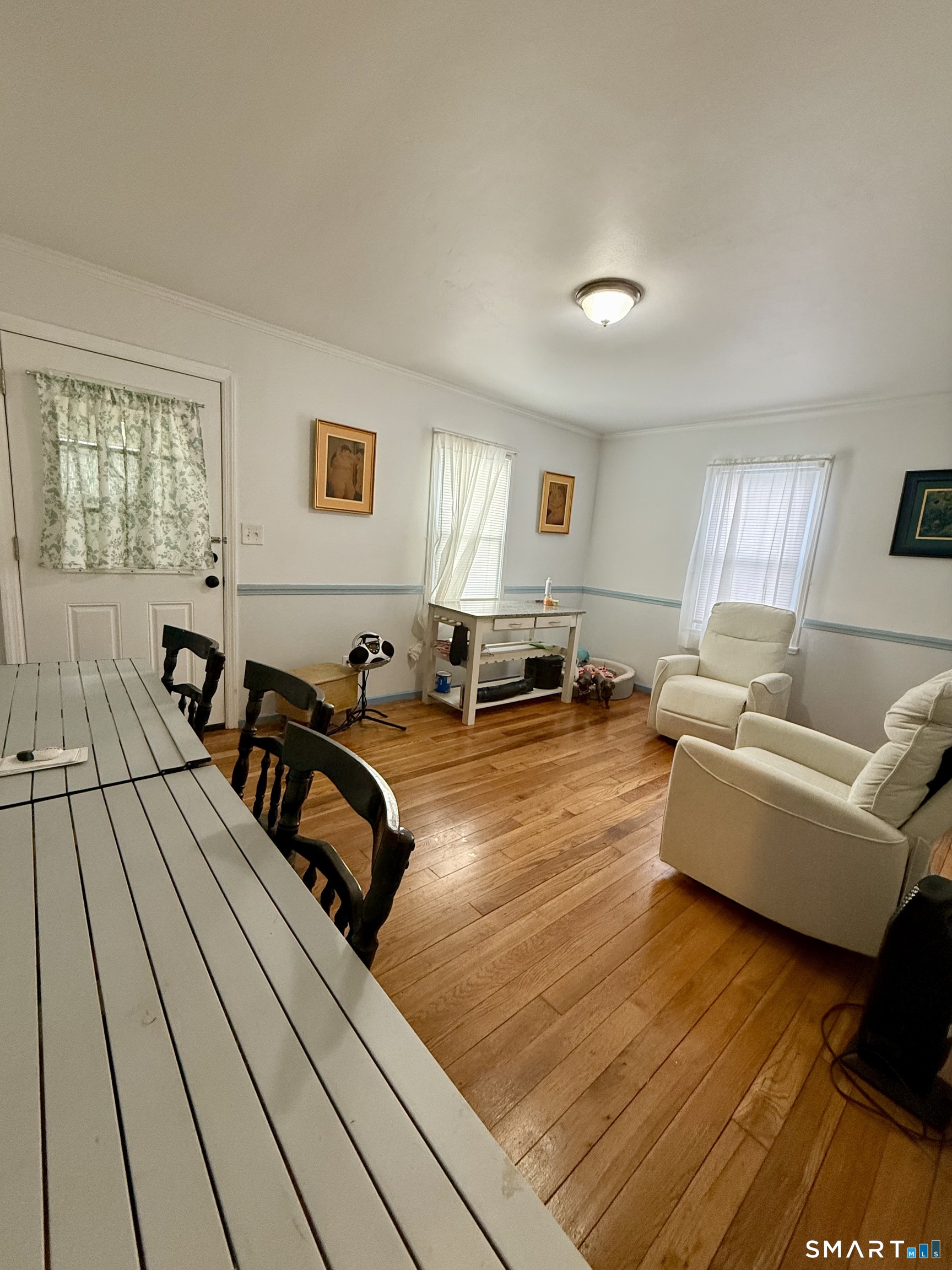 92 Garfield Road Bristol, CT 06010 - Photo 5 of 24 a living room with furniture and a wooden floor
