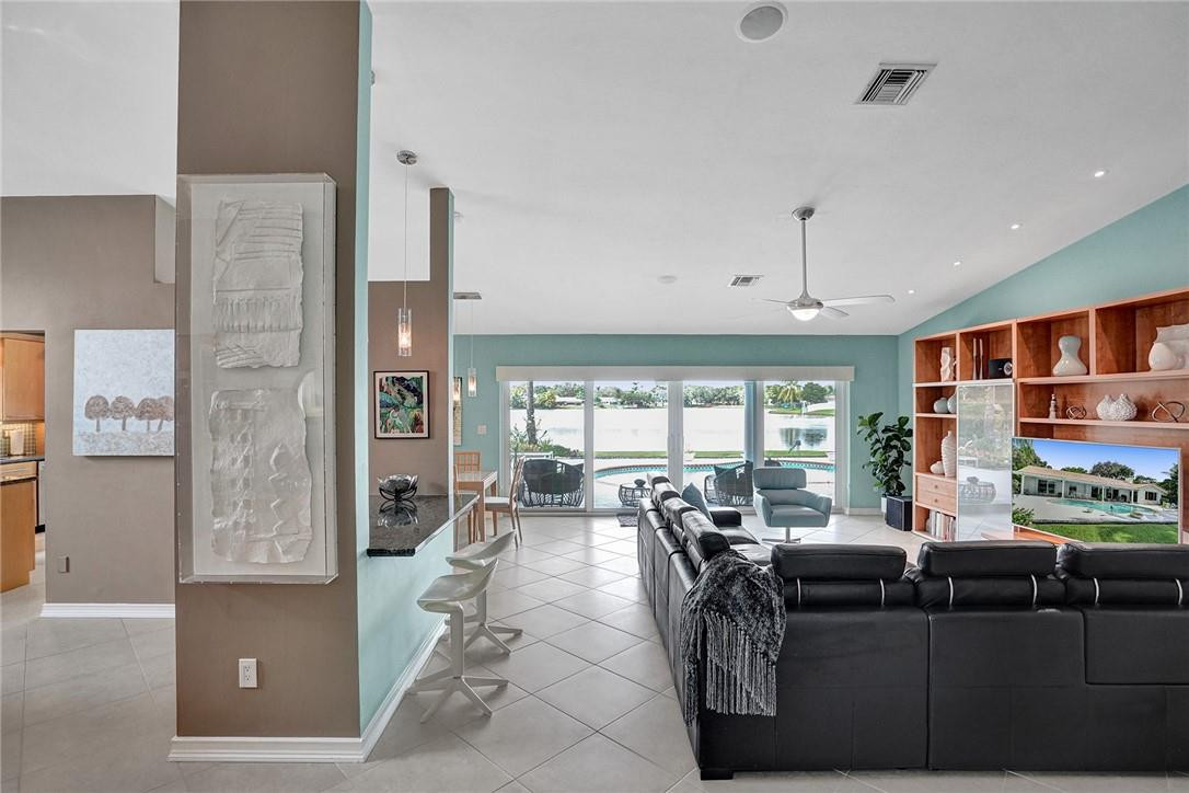 3404 Bridge Road Cooper City, FL 33026 - Photo 9 of 88 a living room with lots of furniture and a large window