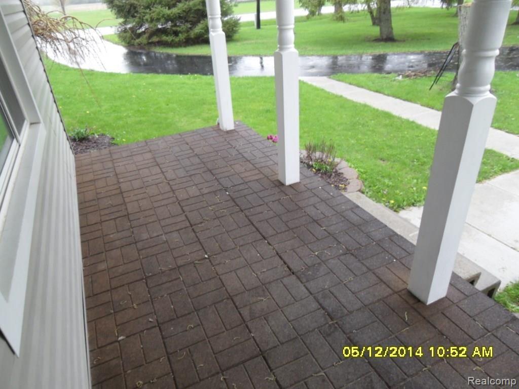 1341 Riley Center Road Memphis, MI 48041 - Photo 4 of 31 front porch.jpg