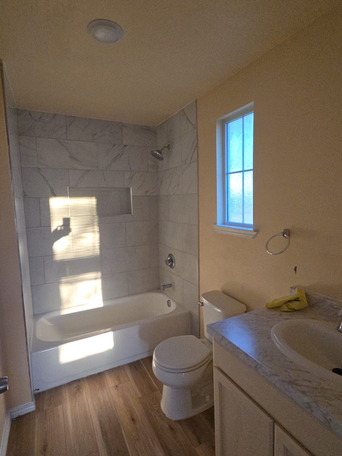 130 Gato Road Cedar Creek, TX 78612 - Photo 9 of 23 Full bath featuring tub / shower combination, light wood-style floors, and vanity