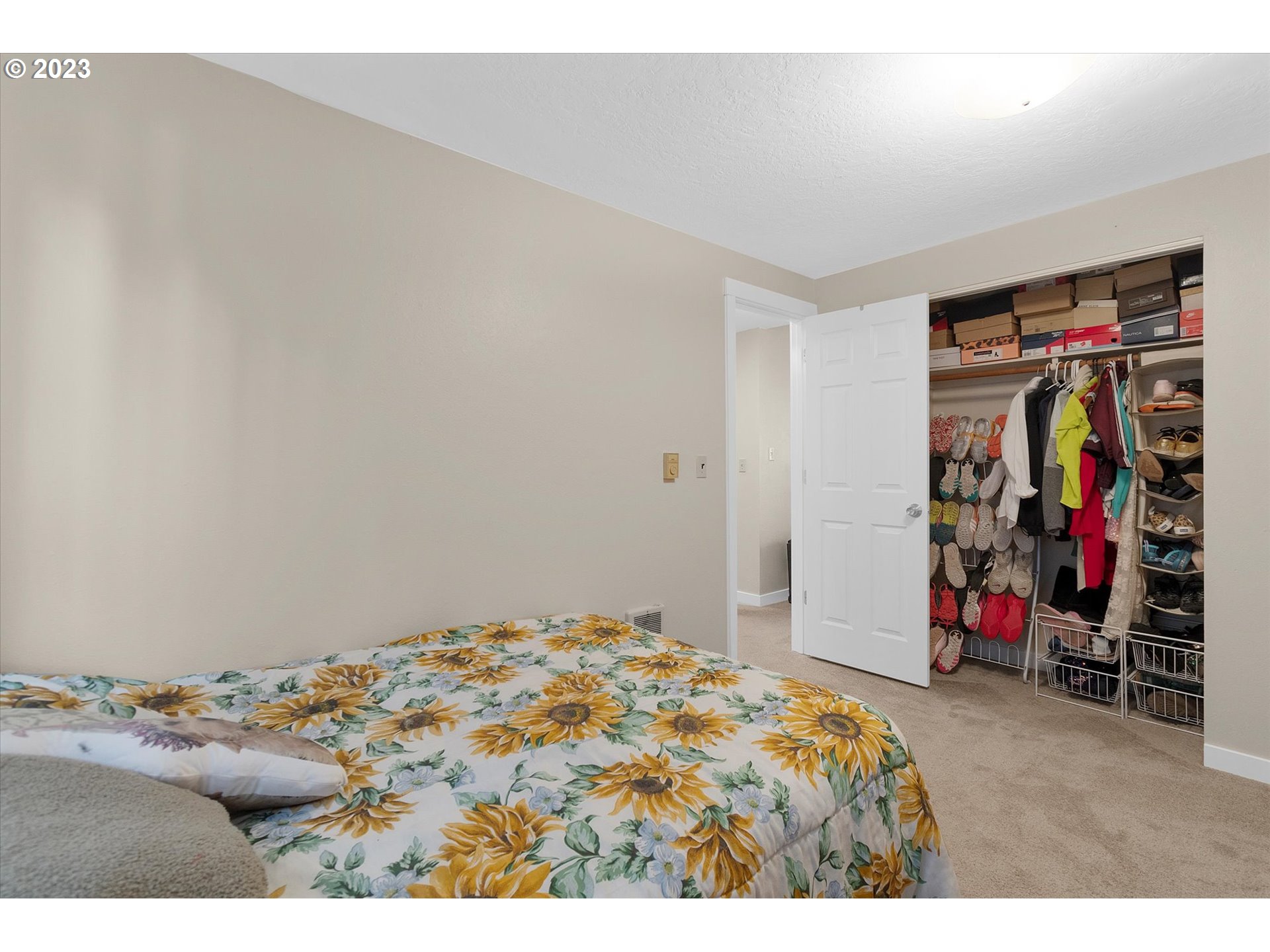 39935 Davis Street Sandy, OR 97055 - Photo 15 of 32 a bedroom with a bed and a closet