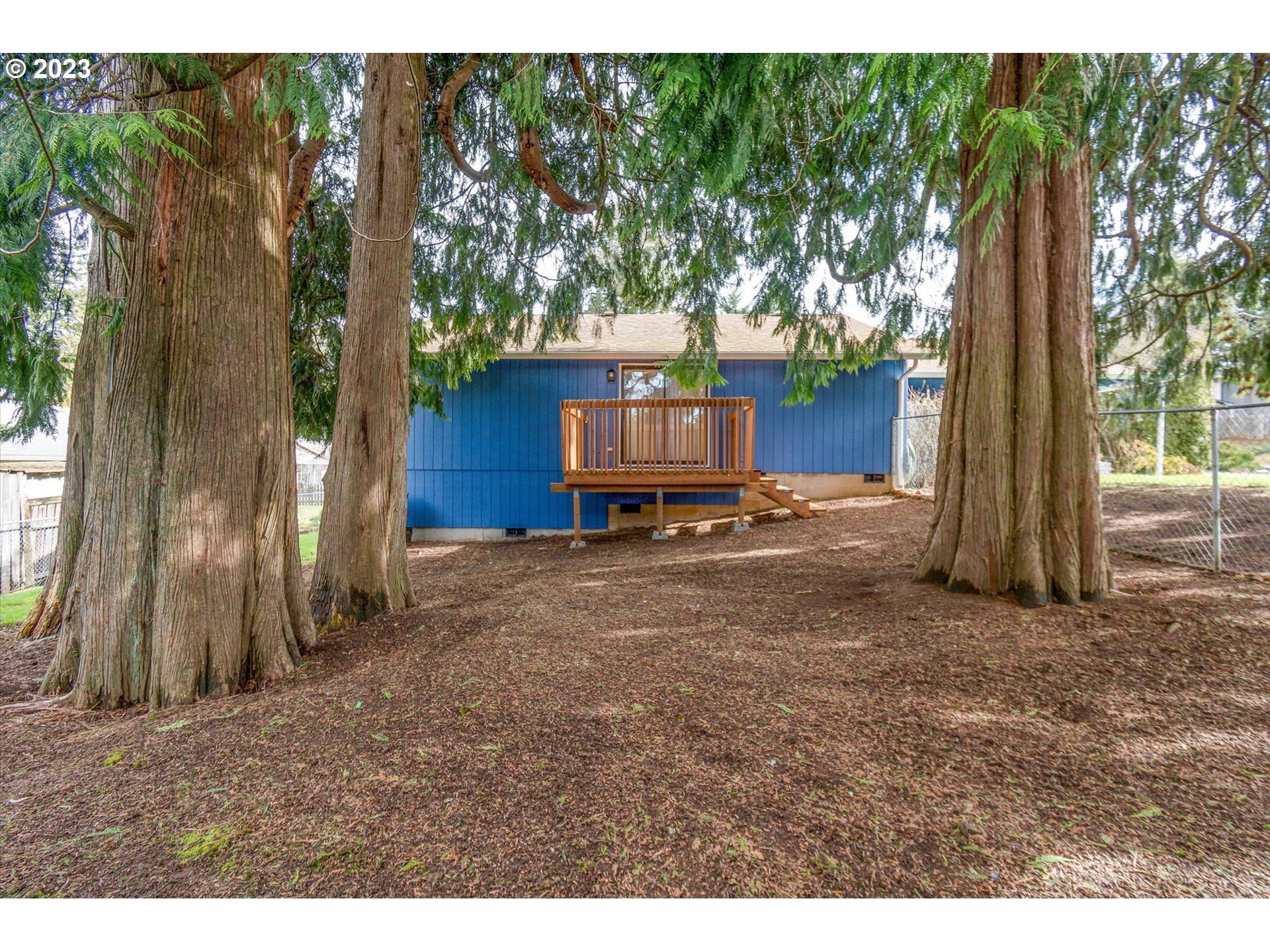 39935 Davis Street Sandy, OR 97055 - Photo 28 of 32 a backyard of a house with lots of green space