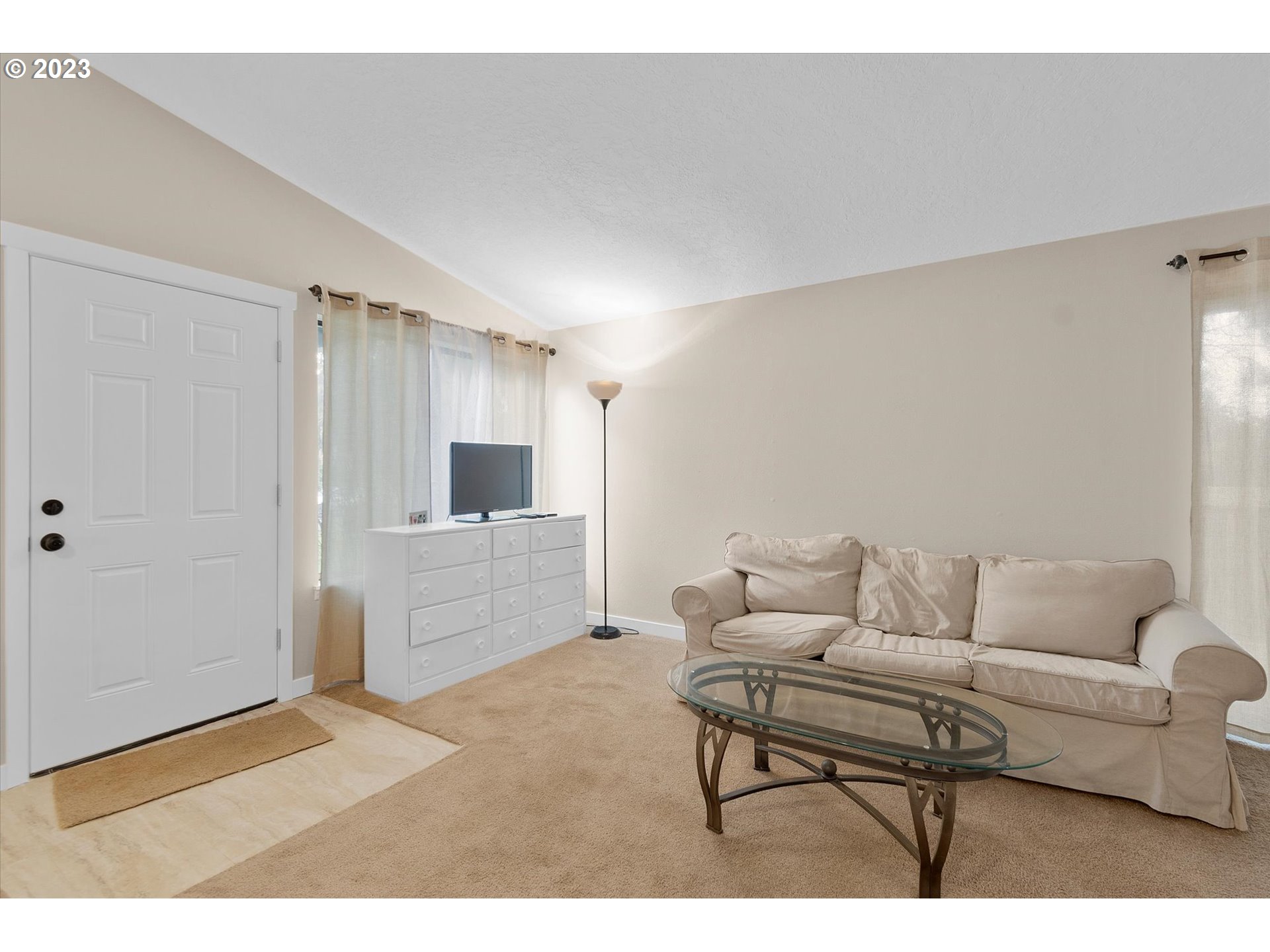 39935 Davis Street Sandy, OR 97055 - Photo 4 of 32 a living room with furniture and a flat screen tv