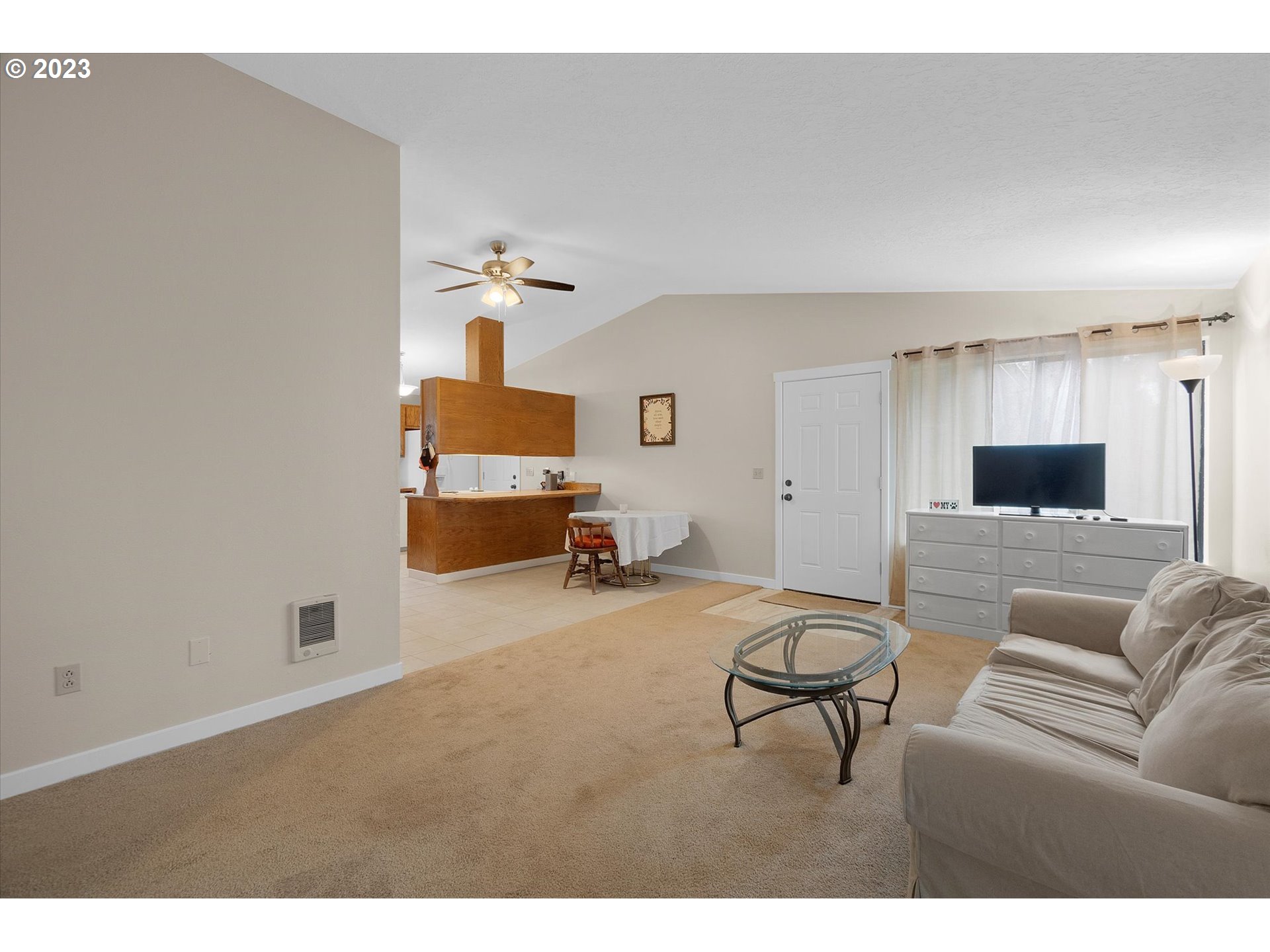 39935 Davis Street Sandy, OR 97055 - Photo 7 of 32 a living room with furniture and a flat screen tv