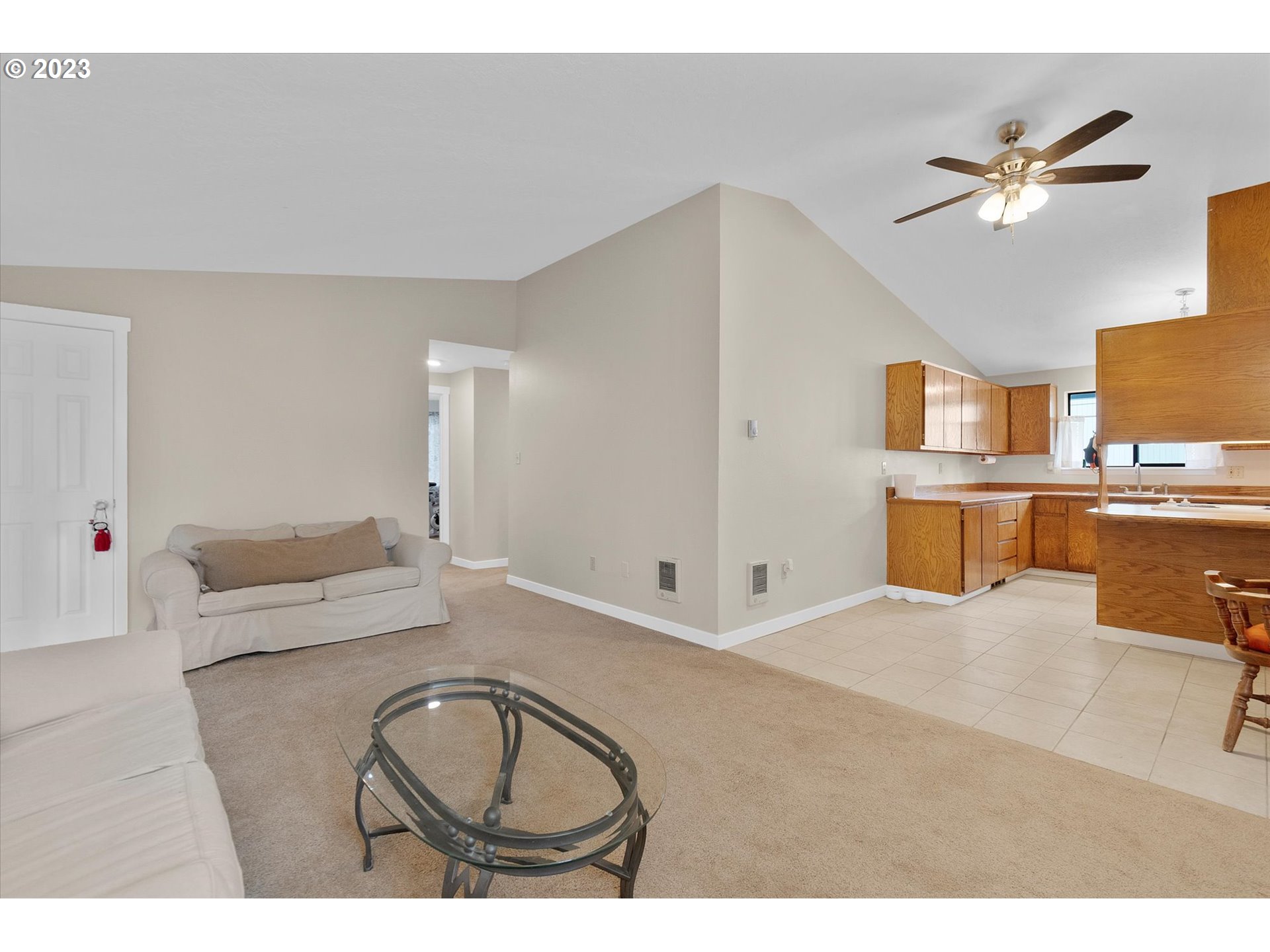 39935 Davis Street Sandy, OR 97055 - Photo 8 of 32 a living room with furniture and a chandelier