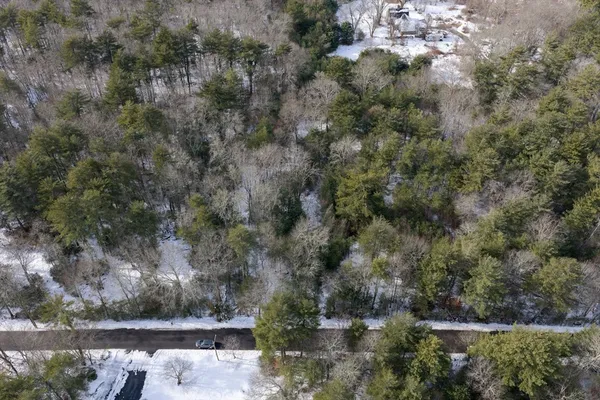an aerial view of residential house with outdoor space