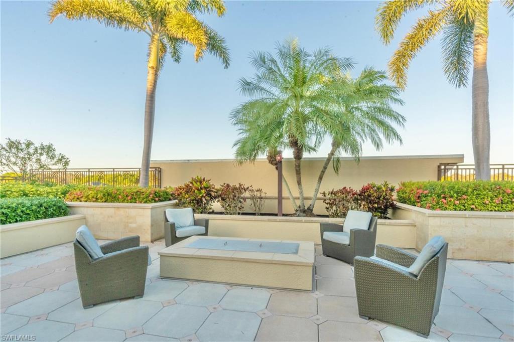 9115 Strada Place, Unit 5317 Naples, FL 34108 - Photo 29 of 30 a view of roof deck with couches and potted plants