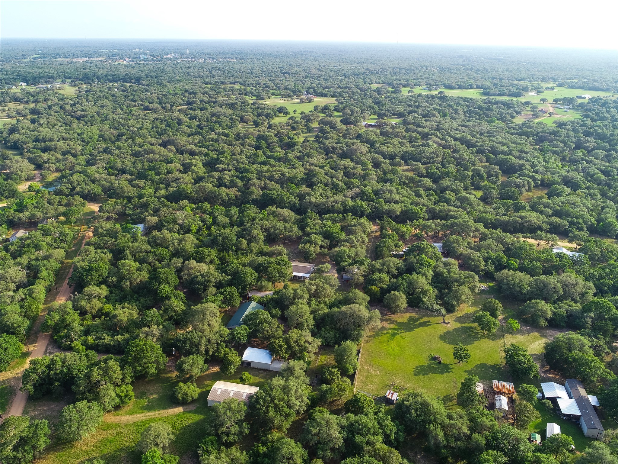 302 Bluebonnet Bend Sheridan, TX 77475 - Photo 16 of 29 a view of a green field