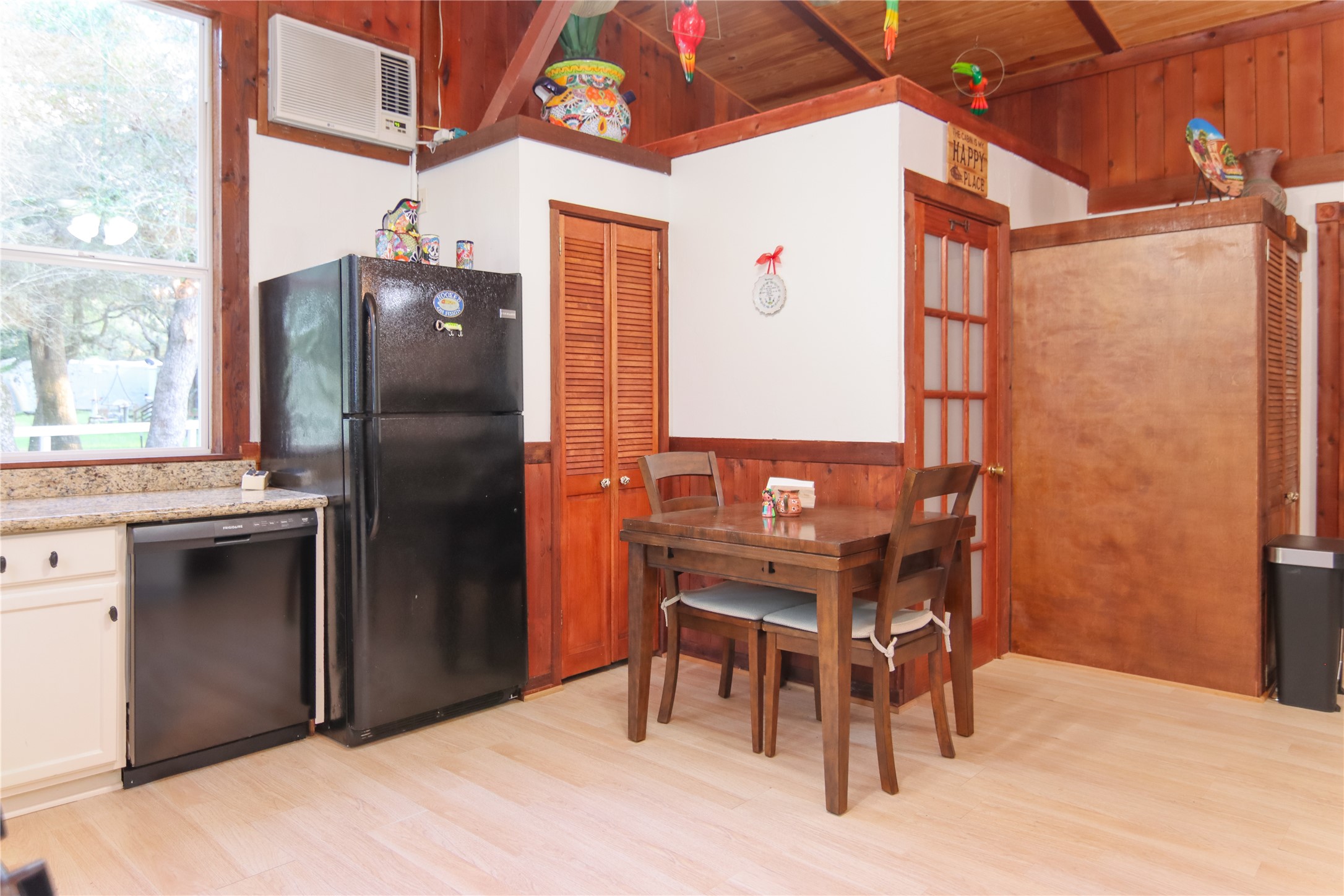 302 Bluebonnet Bend Sheridan, TX 77475 - Photo 24 of 29 a kitchen with stainless steel appliances kitchen island granite countertop furniture a refrigerator and a sink