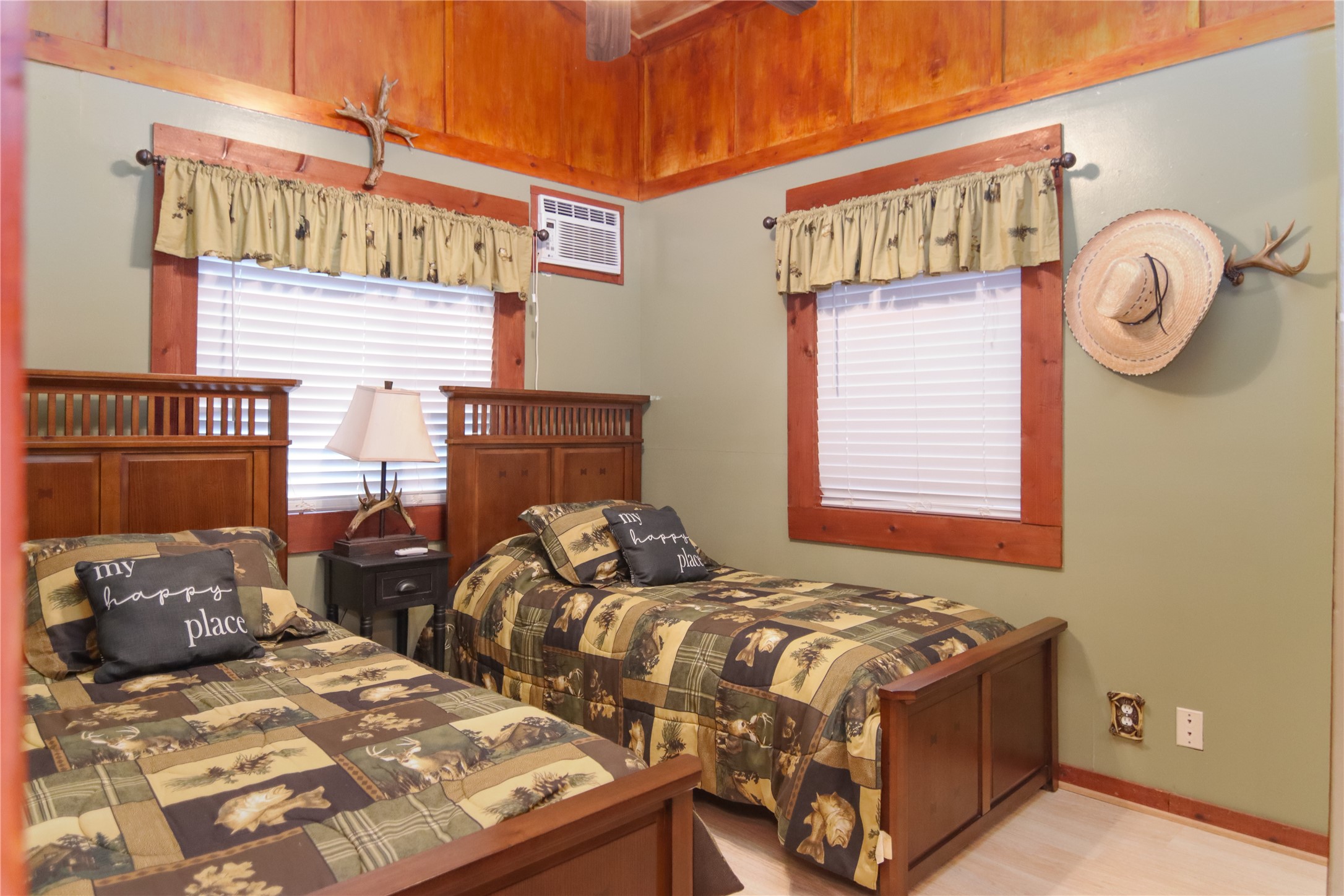 302 Bluebonnet Bend Sheridan, TX 77475 - Photo 28 of 29 a bed sitting in a bedroom next to a window