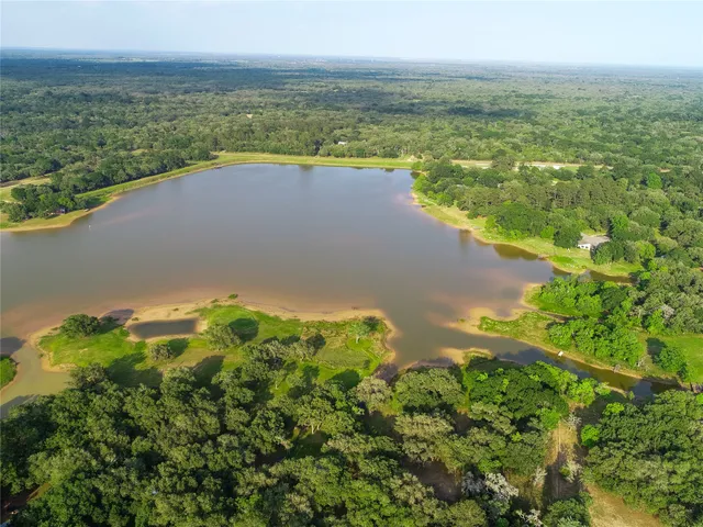 a view of a lake with a city