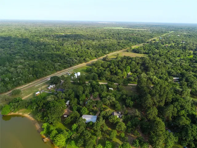 a view of a lake with a city