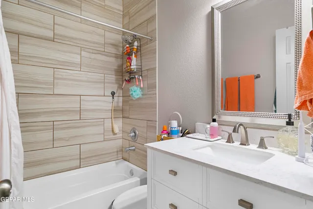 a bathroom with a sink and a bathtub