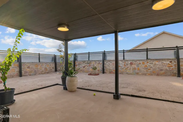 a view of a terrace with sitting area