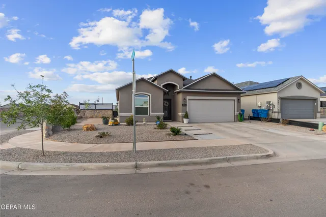 front view of a house with a street