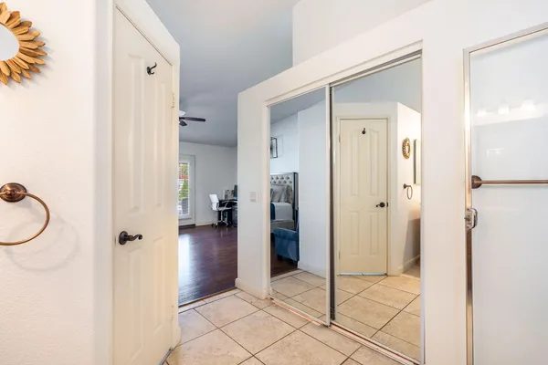 a view of a bathroom from a hallway