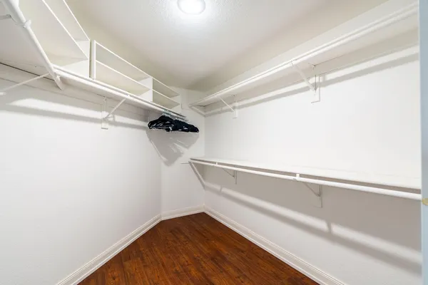 a view of an empty walk in closet