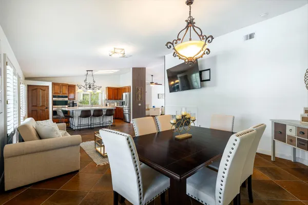 a view of a dining room with furniture